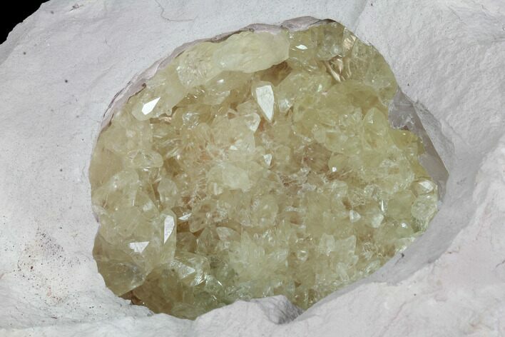 Fluorescent Calcite Geode In Sandstone - Morocco #89690